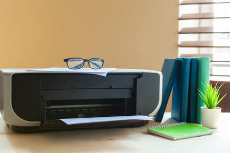 Close up of an office table with printer on itの写真素材