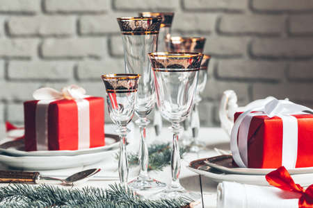 Beautiful red Christmas table setting with decorations close upの写真素材