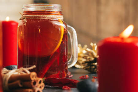 Beautiful composition with glint wine cup and ingridients on wooden tableの写真素材