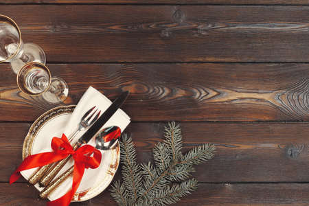 Beautiful red Christmas table setting with decorations close upの写真素材
