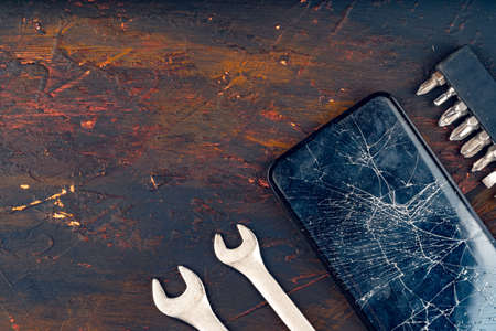 Mobile smartphone with broken screen close upの写真素材