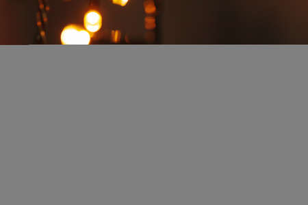 Abstract Christmas lights garland on dark backgroundの写真素材