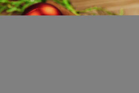 Close up shot of a Christmas decor details on wooden boardの写真素材