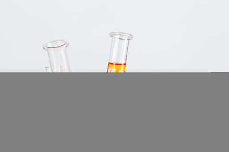 Test flasks with color samples on light grey backgroundの写真素材