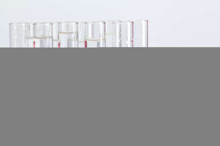 Test flasks with color samples on light grey backgroundの写真素材