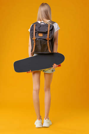 Unrecognizable woman with skateboard. Sports, leisure conceptの写真素材