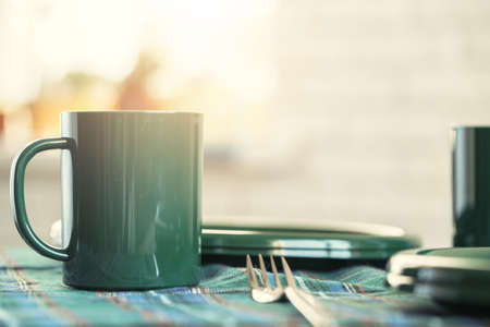 Green plastic kitchenware on a table close upの写真素材