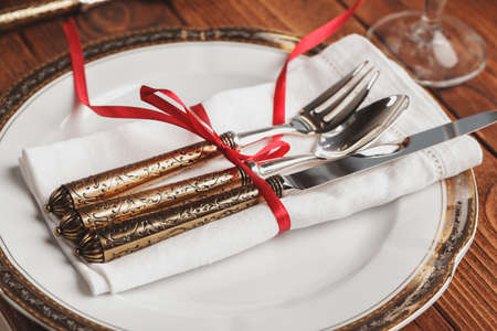 Close up of holiday table setting modern interiorの写真素材