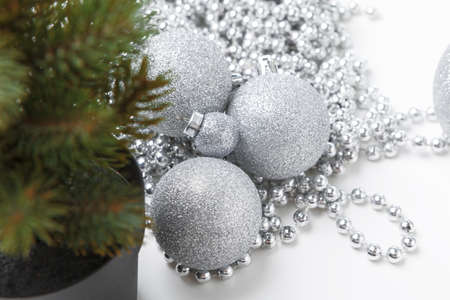 Christmas decorations with baubles isolated on white backgroundの写真素材