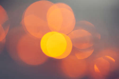 Abstract Gold bokeh sparkle on dark background