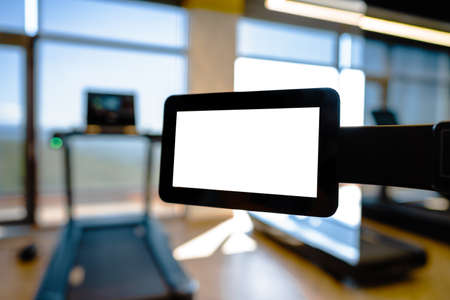 Close up of white screen on gym apparatus in a luxury gymの写真素材