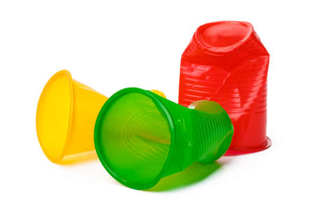 Recyclable crushed plastic cup isolated on white backgroundの写真素材