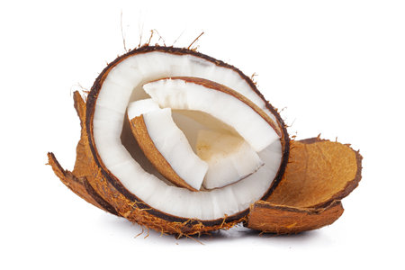 broken coconut on a white background close up