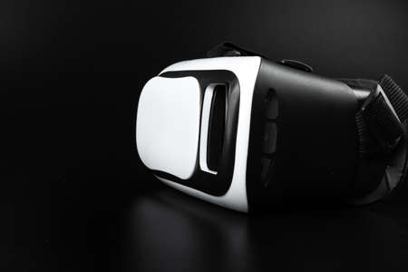 VR virtual reality glasses on a black table.
