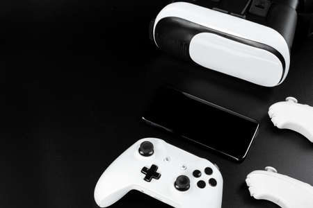 VR virtual reality glasses on a black table.の写真素材