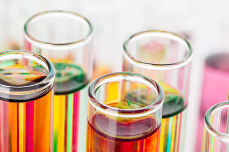 Still life in laboratory. Test tubes with colorful chemicalsの写真素材