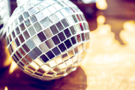 Sparkling disco ball in a day light. Concept of party.の写真素材