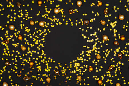 Christmas pattern of holiday decorations on dark backgroundの写真素材