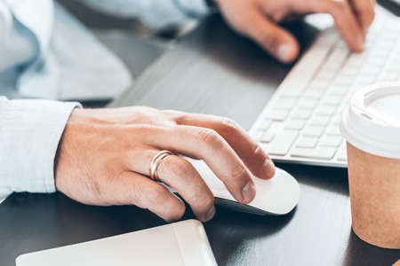 business man working in an office at his workplaceの写真素材