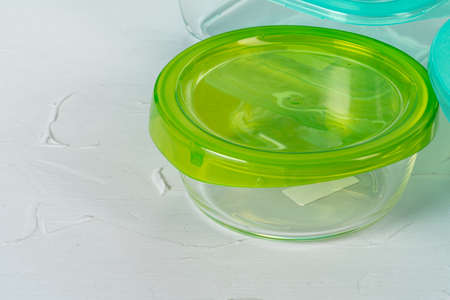 Set of plastic boxes kitchen ware on kitchen counterの写真素材