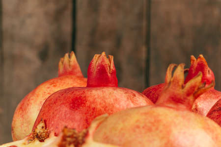 Group of pomegranate fruits close up backgroundの写真素材