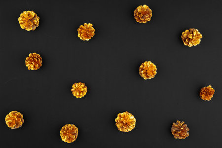 Christmas pattern of holiday decorations on dark backgroundの写真素材