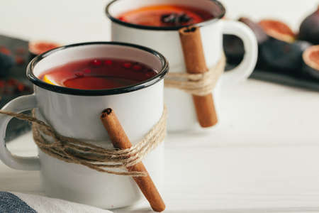 New Year composition with mulled wine on dark wooden backgroundの写真素材