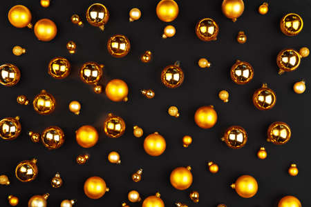 Christmas pattern of holiday decorations on dark backgroundの写真素材