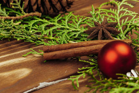 Close up shot of a Christmas decor details on wooden boardの写真素材