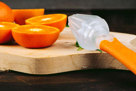 Sliced into pieces juicy ripe oranges close upの写真素材