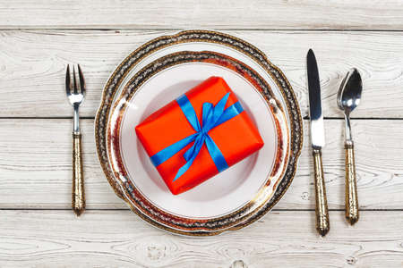 Top view of a beautiful table setting on white wooden backgroundの写真素材