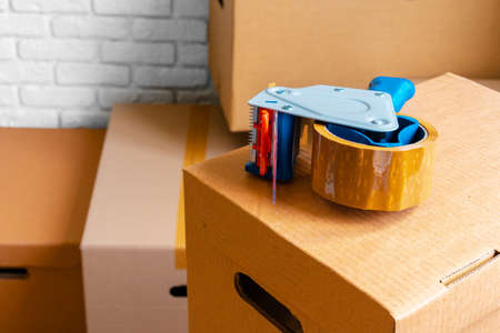 Close up of moving carton boxes in an empty roomの写真素材