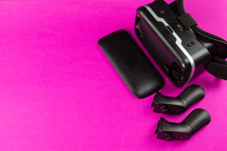 VR Headset on color table background
