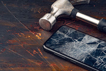 Digital gadget with tools. Repairing smartphone conceptの写真素材