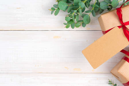 Christmas composition with Christmas gift on wooden backgroundの写真素材