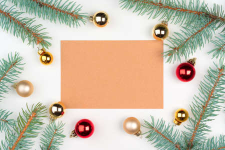 Top view of empty letter on wooden table with christmas decoration