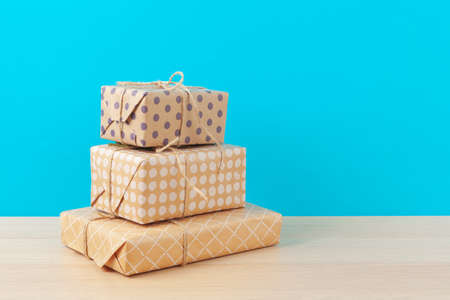 Decorated gift boxes on light blue backgroundの写真素材