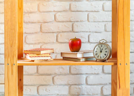 Wooden shelf with home decor on otの写真素材