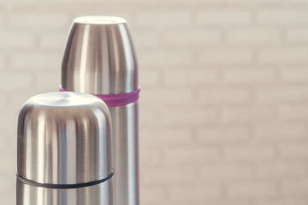 Close up of a thermos flask in a daylightの写真素材