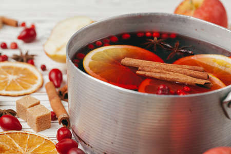 Christmas hot mulled wine in rustic cup close upの写真素材