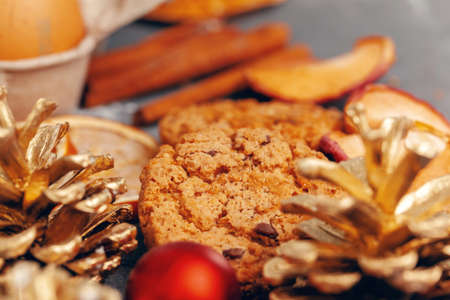 Dried fruit slices with cookies close up on kitchen tableの写真素材