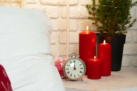 Interior decoration with red and white Christmas candlesの写真素材
