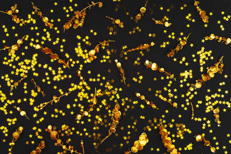 Christmas pattern of holiday decorations on dark backgroundの写真素材