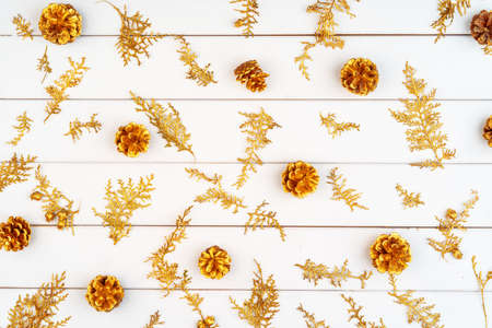 Christmas pattern of holiday decorations on white wooden backgroundの写真素材