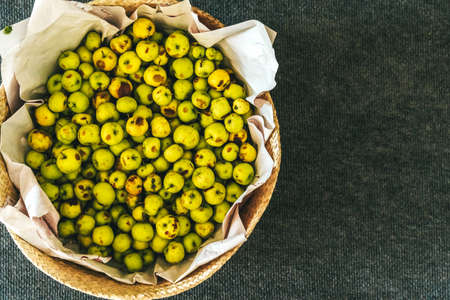 Basket with small green apples close upの写真素材