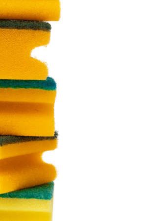 Stack of kitchen sponges isolated on white backgroundの写真素材