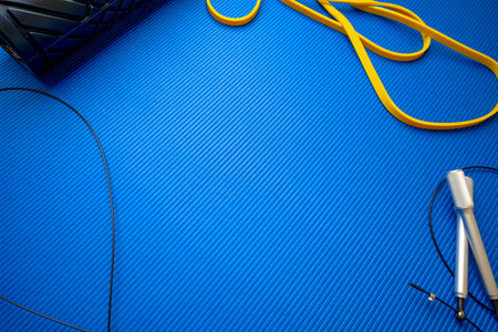 Jumping rope on blue mat background in a gym