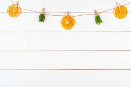 Christmas decorations on white wooden background with copy spaceの写真素材