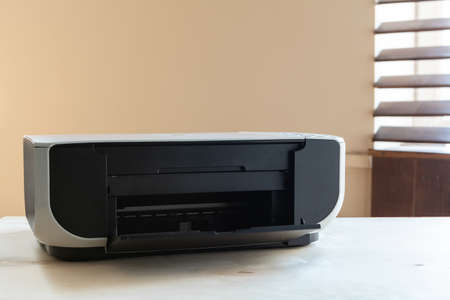 Close up of an office table with printer on it