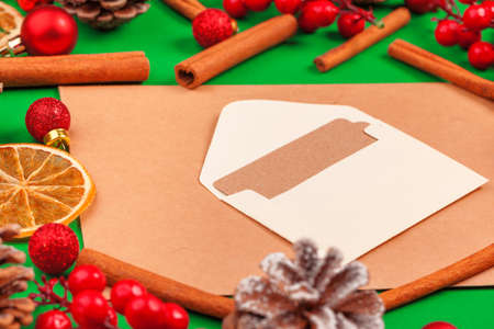 Christmas background with cones and pine branches on greenの写真素材